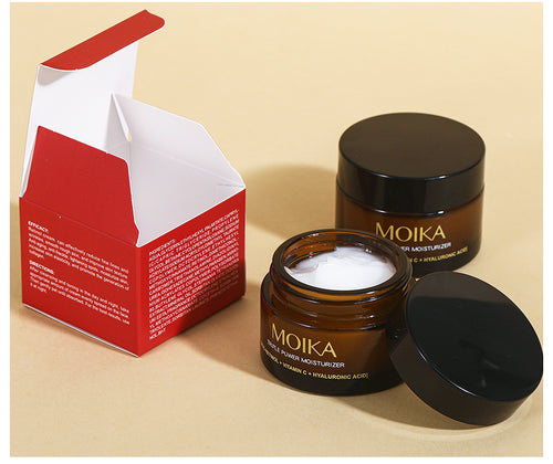 Pot ouvert de crème MOIKA Triple Power avec son emballage